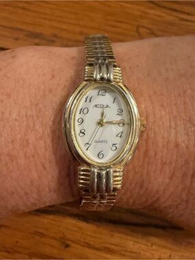 Vintage Acqua Timex Two-Tone Gold and Silver Oval Women's stainless steel CW